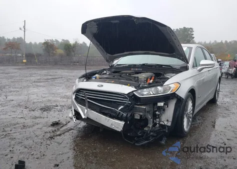 2014 Ford Fusion Hybrid Titanium z USA, uszkodzony, nr VIN 3FA6P0RUXER274315